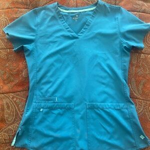 Teal Scrub top in size small Med couture